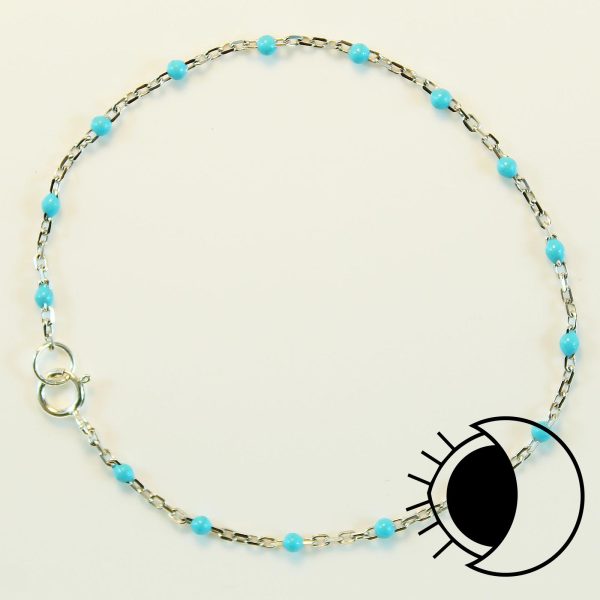 Sterling silver flat cable satellite chain bracelet with turquoise enamel bead.